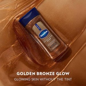 ژل روغنی براق‌ و برنزه کننده بدن وازلین مدل Sunlit Glow حجم 200 میل